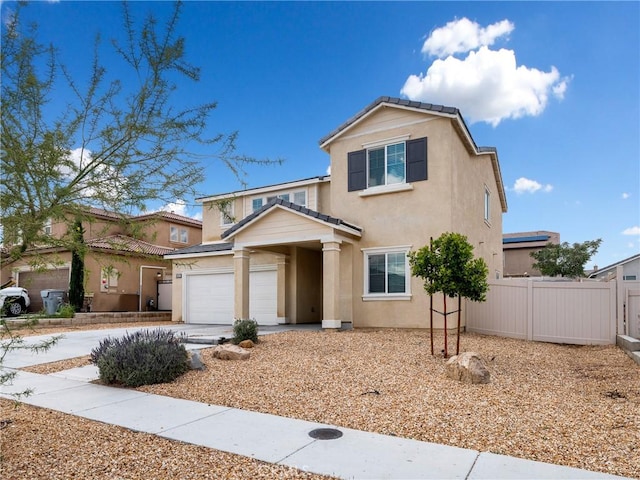10630 Appaloosa Ave, Hesperia, CA 92345 - view of front of home with fence, stucco siding, driveway, and a tile roof