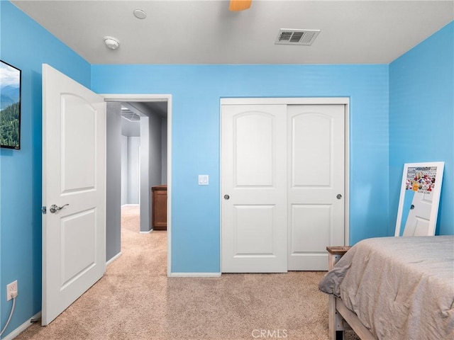 10630 Appaloosa Ave, Hesperia, CA 92345 - bedroom featuring light carpet, a closet, baseboards, and ceiling fan