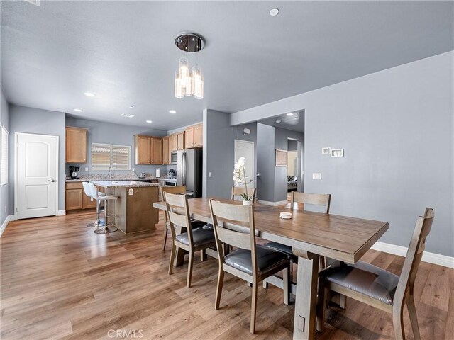 10630 Appaloosa Ave, Hesperia, CA 92345 - dining space with a chandelier, baseboards, light wood finished floors, and recessed lighting