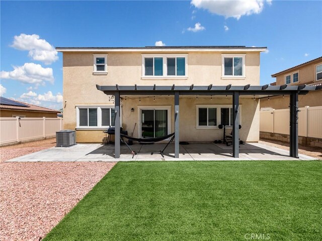 10630 Appaloosa Ave, Hesperia, CA 92345 - back of house with stucco siding, central AC, a pergola, and a patio