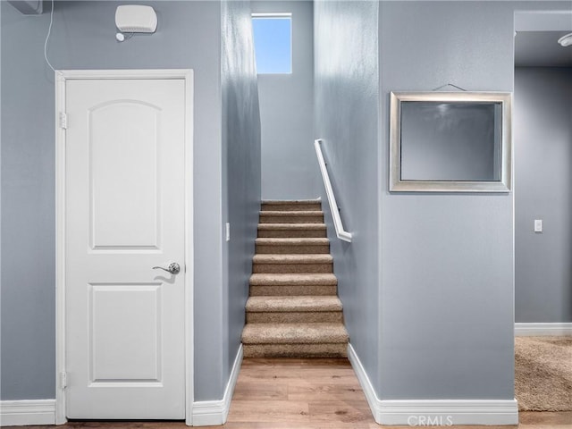 10630 Appaloosa Ave, Hesperia, CA 92345 - staircase with wood finished floors and baseboards