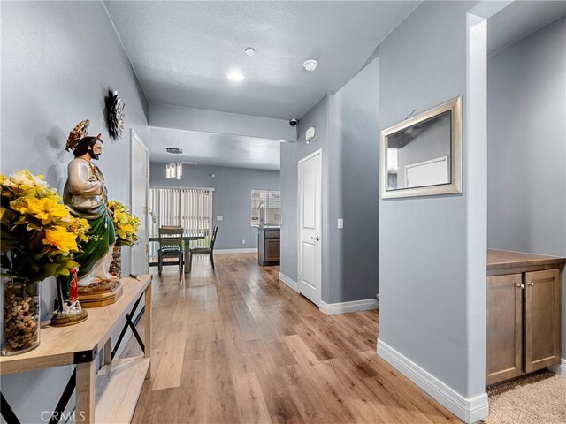 10630 Appaloosa Ave, Hesperia, CA 92345 - hall with light wood-style flooring and baseboards