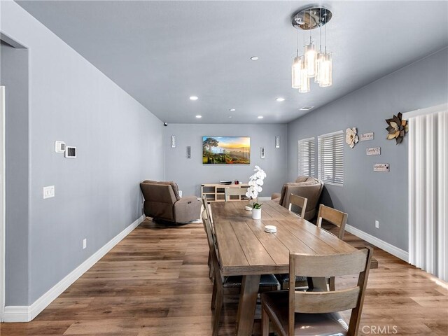 10630 Appaloosa Ave, Hesperia, CA 92345 - dining area with baseboards, recessed lighting, wood finished floors, and a chandelier