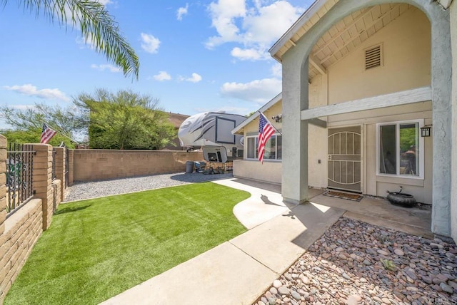 view of yard with a patio area