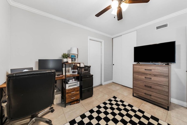 office with crown molding, ceiling fan, light tile patterned floors, and baseboards