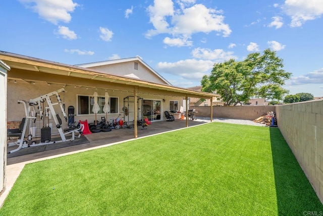 rear view of property with a patio and stucco siding