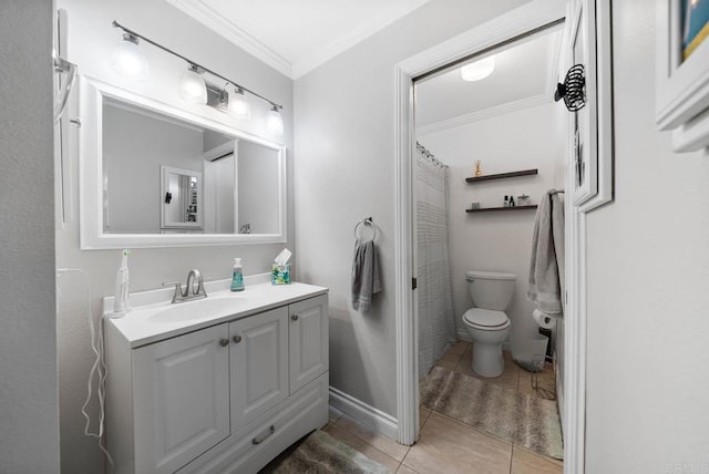 bathroom featuring crown molding, vanity, toilet, and tile patterned floors