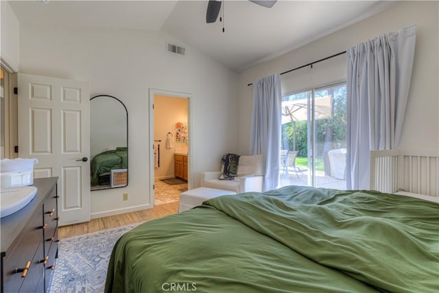 1918 Potter Rd, Chico, CA 95928 - bedroom featuring access to exterior, lofted ceiling, light wood-type flooring, ensuite bathroom, and ceiling fan