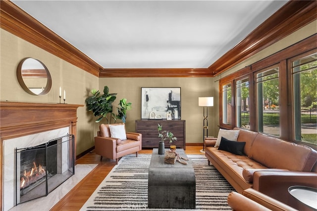 1156 E Howard St, Pasadena, CA 91104 - living room featuring a fireplace, wood finished floors, ornamental molding, and baseboards