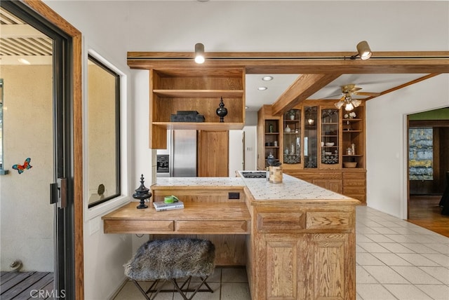 1156 E Howard St, Pasadena, CA 91104 - kitchen featuring open shelves, light tile patterned floors, a ceiling fan, light countertops, and a peninsula