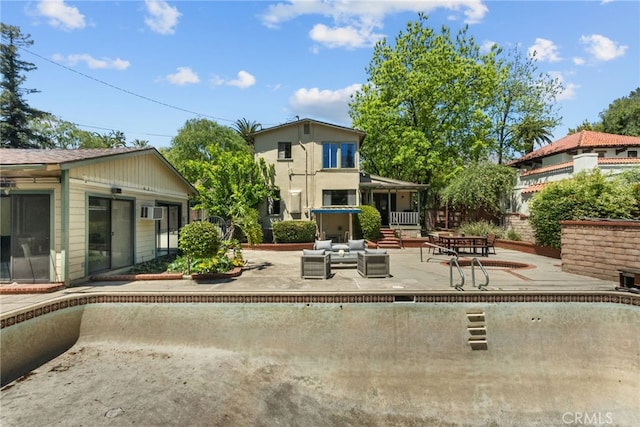 1156 E Howard St, Pasadena, CA 91104 - rear view of property featuring a patio area