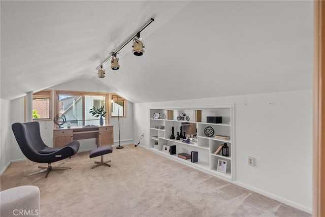 1156 E Howard St, Pasadena, CA 91104 - living area with baseboards, lofted ceiling, carpet flooring, rail lighting, and built in features