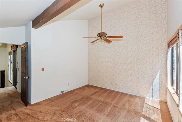 27657 Peninsula Dr, Lake Arrowhead, CA 92352 - empty room with light carpet, a ceiling fan, wallpapered walls, and beamed ceiling