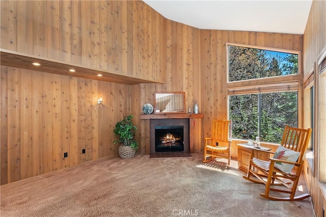 27657 Peninsula Dr, Lake Arrowhead, CA 92352 - living area featuring carpet flooring, a fireplace, and wooden walls