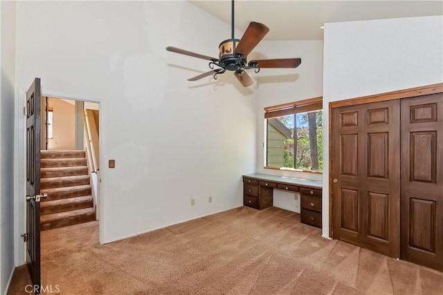 27657 Peninsula Dr, Lake Arrowhead, CA 92352 - unfurnished bedroom featuring a towering ceiling and light carpet