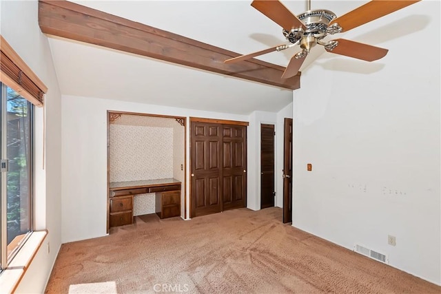 27657 Peninsula Dr, Lake Arrowhead, CA 92352 - unfurnished bedroom with carpet floors, multiple closets, and ceiling fan