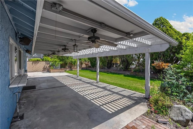 view of patio / terrace featuring a ceiling fan and a pergola