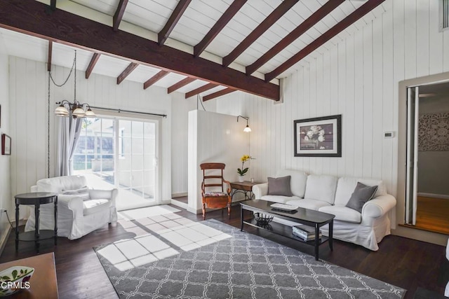 living room with wood finished floors and wood walls