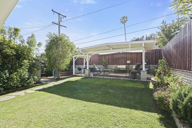 view of yard with a patio area