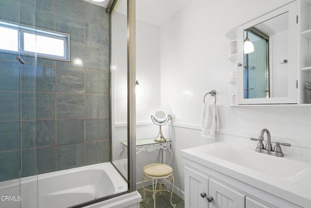 bathroom with wainscoting and vanity