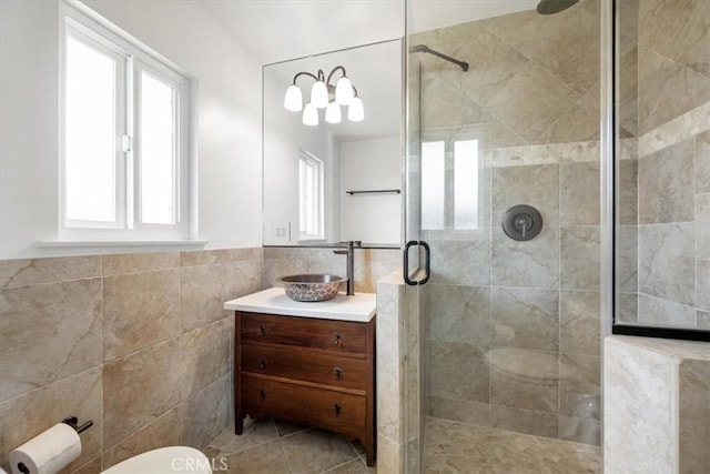 1264 Vista Del Osos, Los Osos, CA 93402 - bathroom featuring tile walls, a tile shower, vanity, tile patterned flooring, and wainscoting