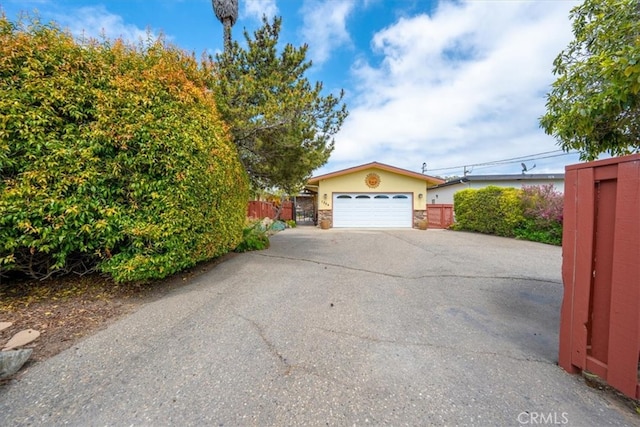 1264 Vista Del Osos, Los Osos, CA 93402 - view of front of property featuring stucco siding, a garage, and fence