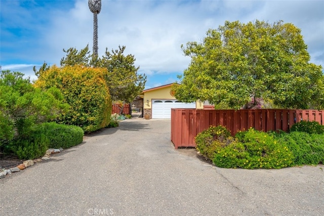 1264 Vista Del Osos, Los Osos, CA 93402 - garage featuring fence and asphalt driveway