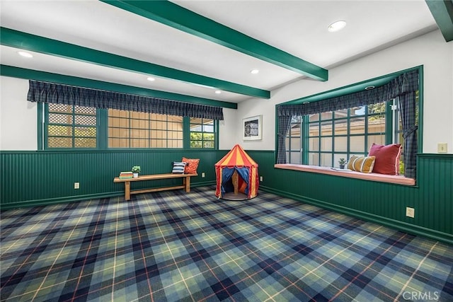 game room with a wainscoted wall, beam ceiling, carpet floors, and recessed lighting