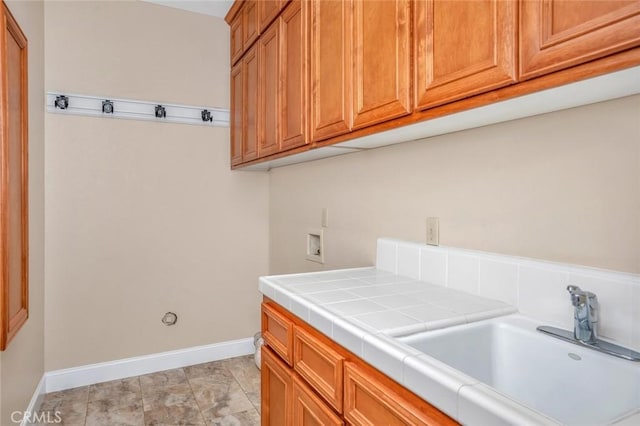 3894 Avocet Dr, Merced, CA 95340 - washroom with hookup for a washing machine, cabinet space, and baseboards