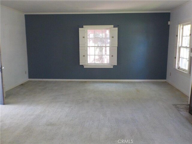 2698 Fremontia Dr, San Bernardino, CA 92404 - carpeted empty room with crown molding and baseboards