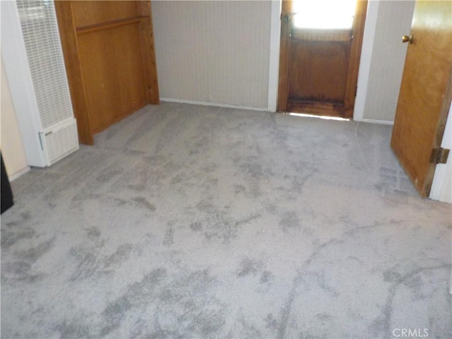 2698 Fremontia Dr, San Bernardino, CA 92404 - unfurnished bedroom with carpet floors, a heating unit, and baseboards