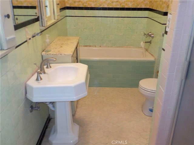 2698 Fremontia Dr, San Bernardino, CA 92404 - full bathroom with toilet and tile walls