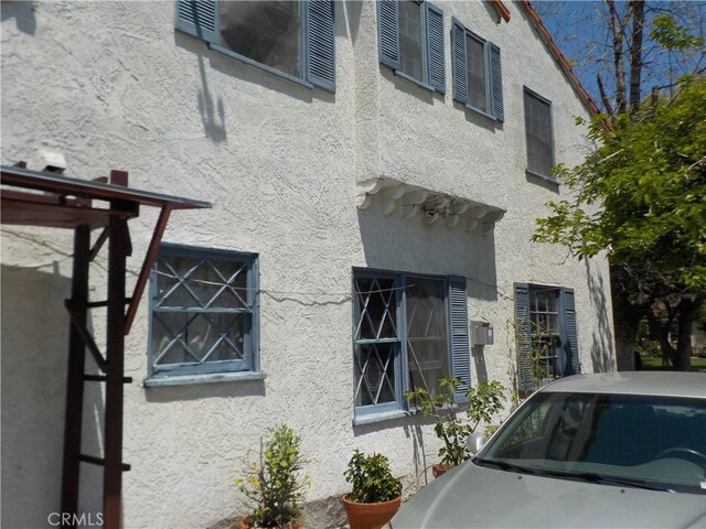 2698 Fremontia Dr, San Bernardino, CA 92404 - view of property exterior with stucco siding