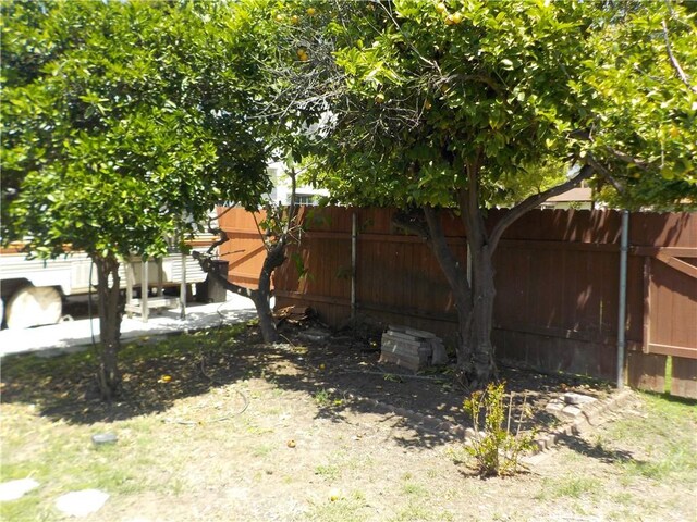 2698 Fremontia Dr, San Bernardino, CA 92404 - view of yard featuring fence
