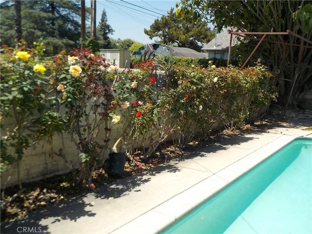2698 Fremontia Dr, San Bernardino, CA 92404 - view of swimming pool with fence
