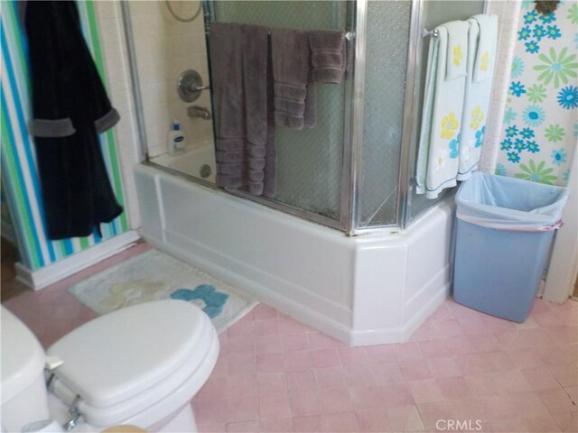 2698 Fremontia Dr, San Bernardino, CA 92404 - full bath with toilet and bath / shower combo with glass door
