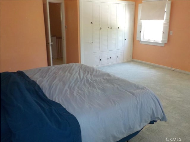 2698 Fremontia Dr, San Bernardino, CA 92404 - carpeted bedroom with a closet and baseboards