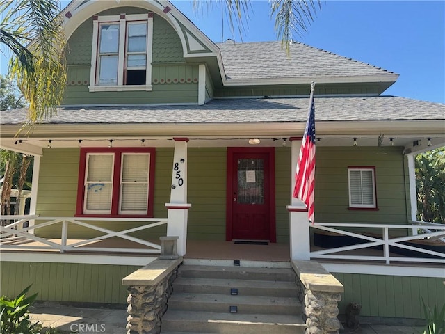 850 E Columbia Ave, Pomona, CA 91767 - view of front of house featuring covered porch and a shingled roof