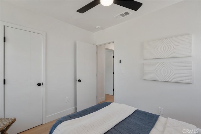 bedroom featuring ceiling fan and wood finished floors