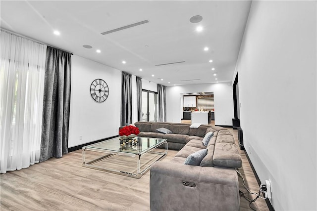 9218 Encino Ave, Northridge, CA 91325 - living room with recessed lighting, light wood finished floors, and baseboards