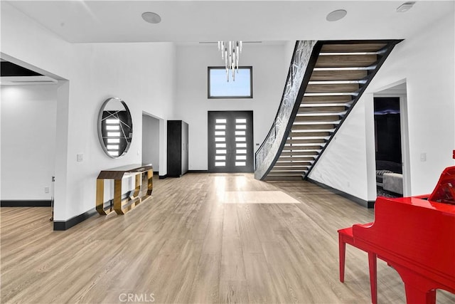 9218 Encino Ave, Northridge, CA 91325 - foyer with wood finished floors, baseboards, stairs, and a high ceiling