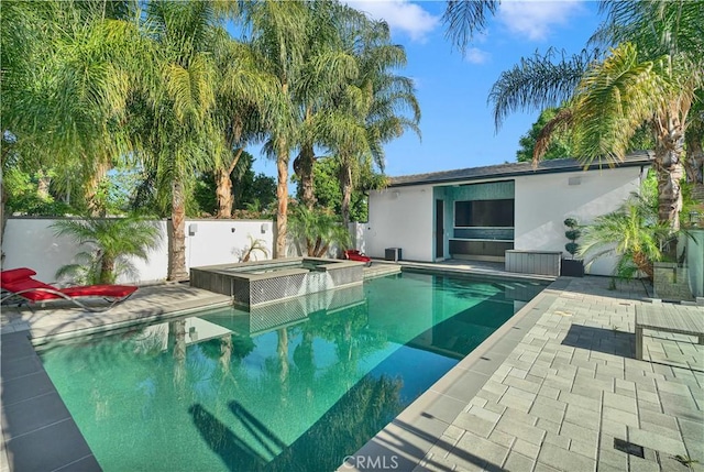 9218 Encino Ave, Northridge, CA 91325 - view of pool with a patio, a pool with connected hot tub, and fence