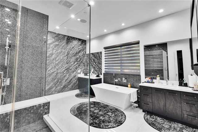 9218 Encino Ave, Northridge, CA 91325 - full bath featuring tile walls, a freestanding tub, vanity, and recessed lighting