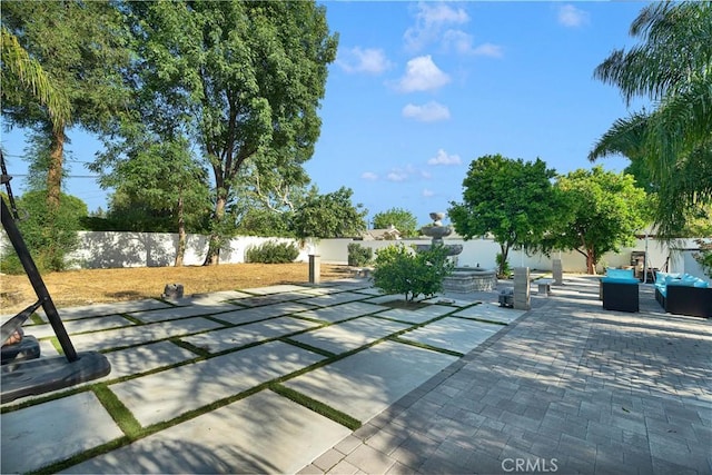 9218 Encino Ave, Northridge, CA 91325 - view of patio featuring a fenced backyard and an outdoor living space