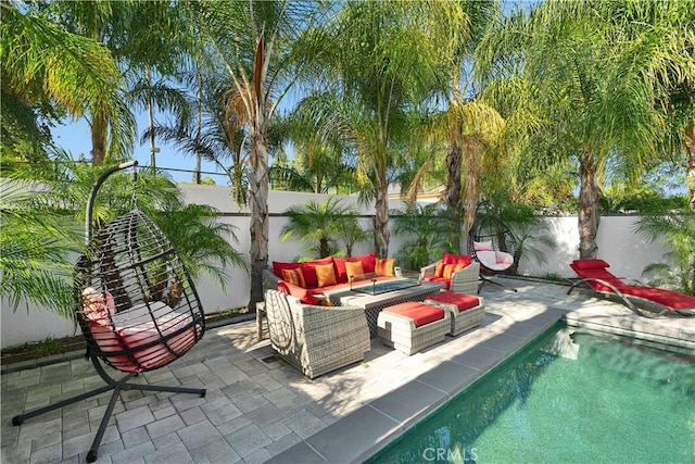 9218 Encino Ave, Northridge, CA 91325 - view of patio featuring an outdoor living space with a fire pit and a fenced backyard
