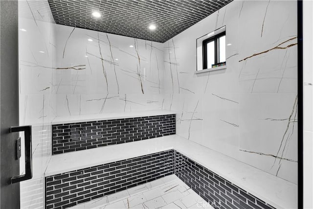 9218 Encino Ave, Northridge, CA 91325 - bathroom featuring marble look tile flooring and tiled shower