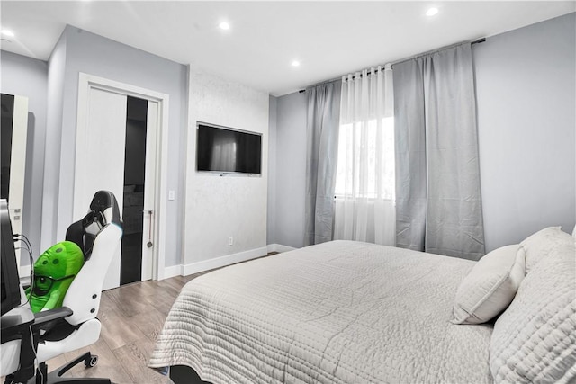 9218 Encino Ave, Northridge, CA 91325 - bedroom featuring wood finished floors, recessed lighting, and baseboards