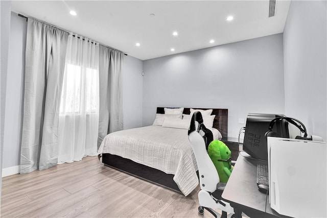 9218 Encino Ave, Northridge, CA 91325 - bedroom with wood finished floors, recessed lighting, a desk, and baseboards
