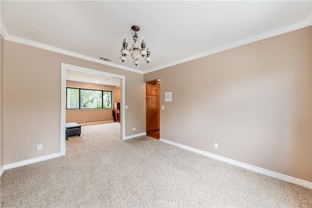 unfurnished room with a chandelier, ornamental molding, baseboards, and light carpet