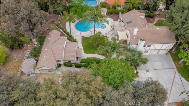 view from above of property featuring a pool